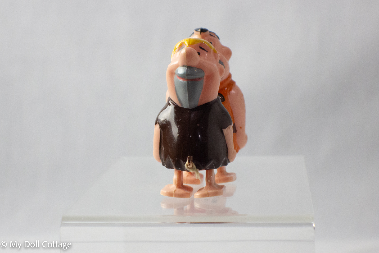 Front view of the Fred & Barney Ramp Walker by Marx Toys, showing two figures joined front-to-back