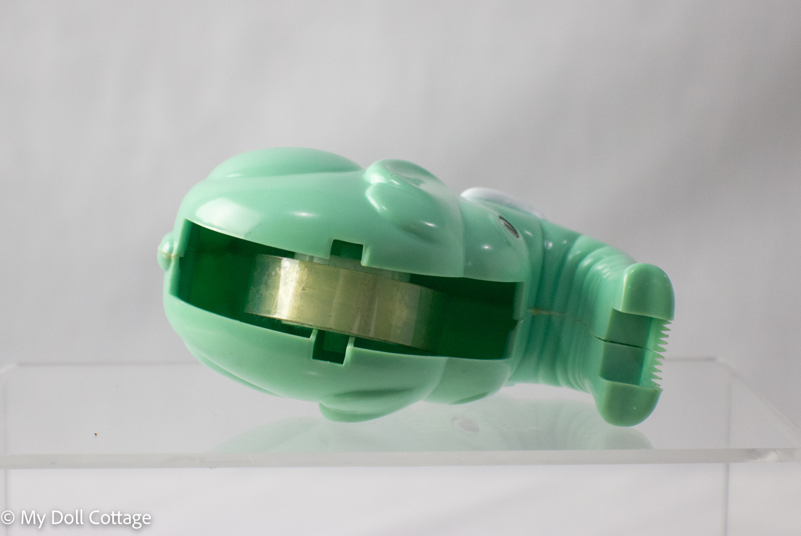 Top angle showing tape roll fitted inside elephant body.