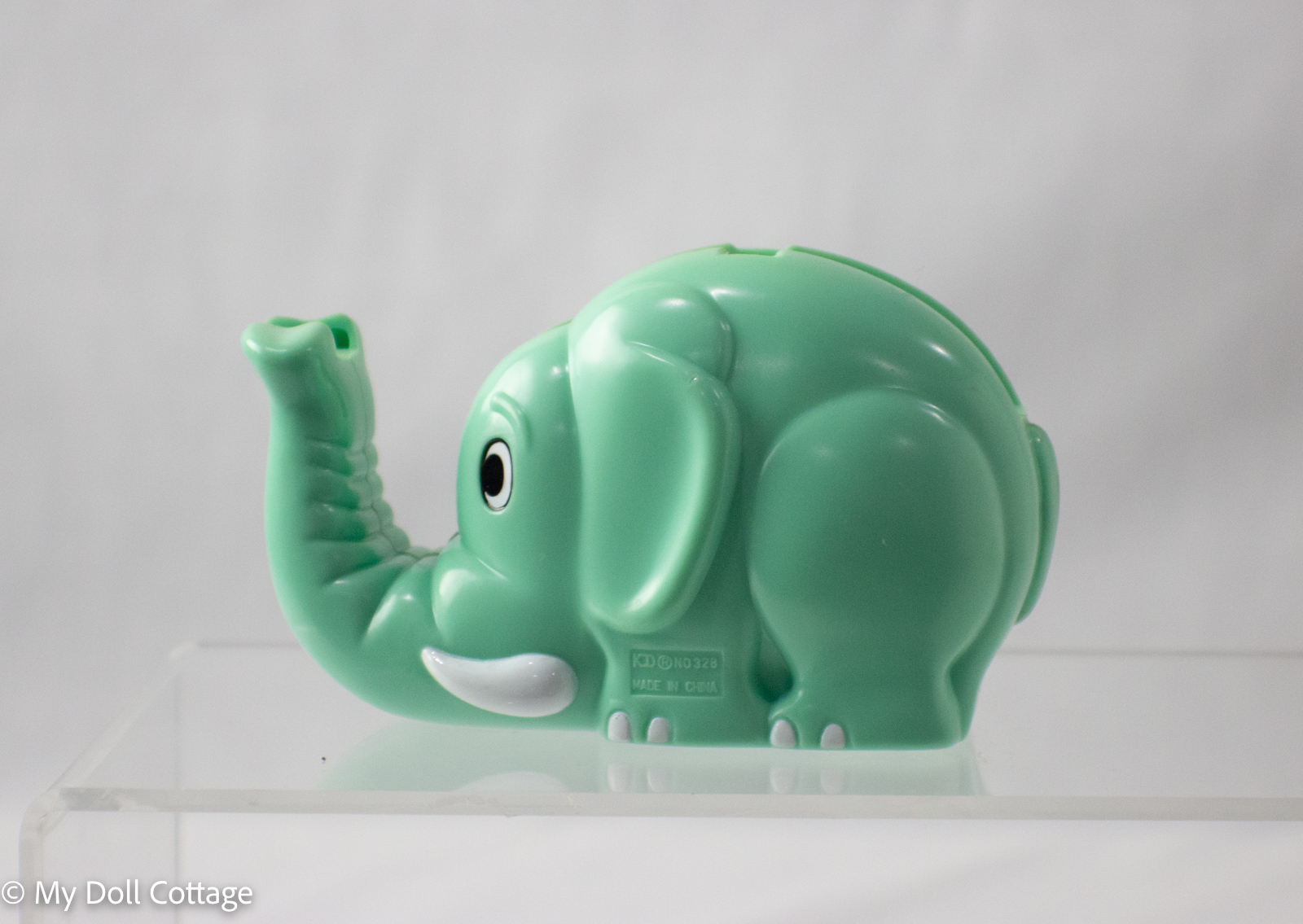 Opposite side view of elephant tape dispenser with KD 12 and No. 328 markings.