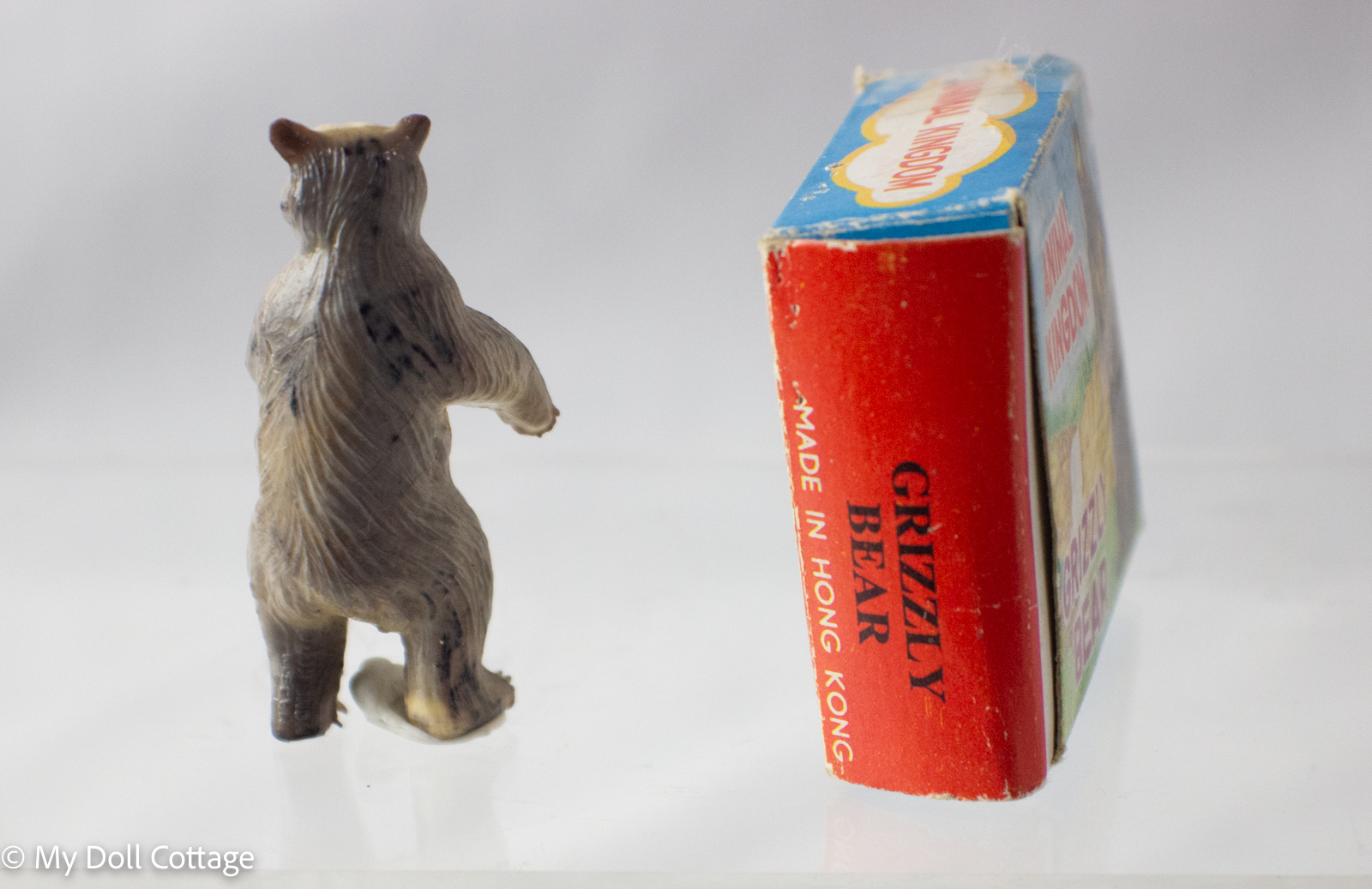 Side angle of figure and box showing “Made in Hong Kong” marking.