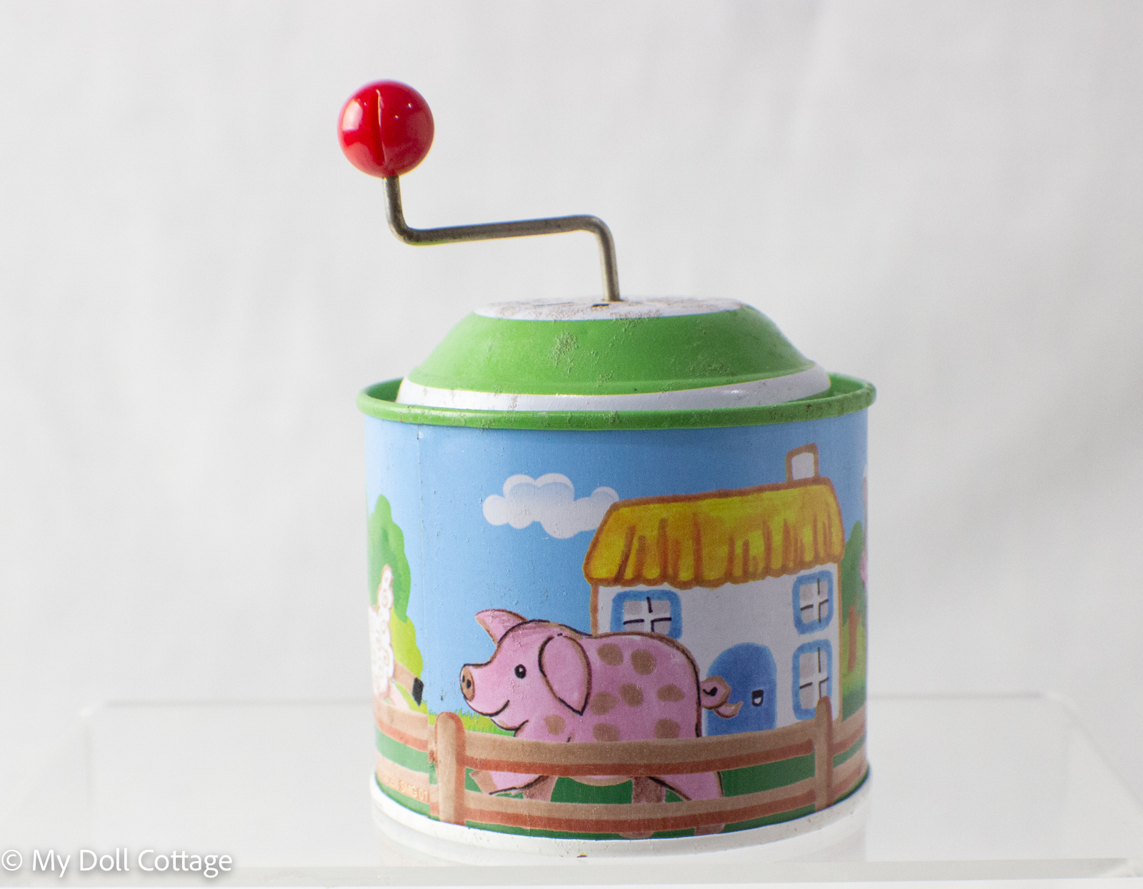 Reverse view showing pink pig and trees.