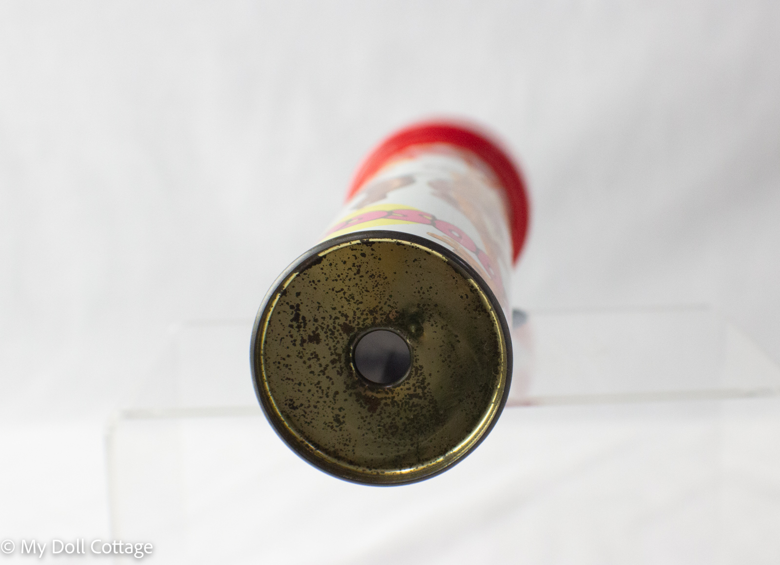 Close-up of metal eyepiece end with viewing aperture