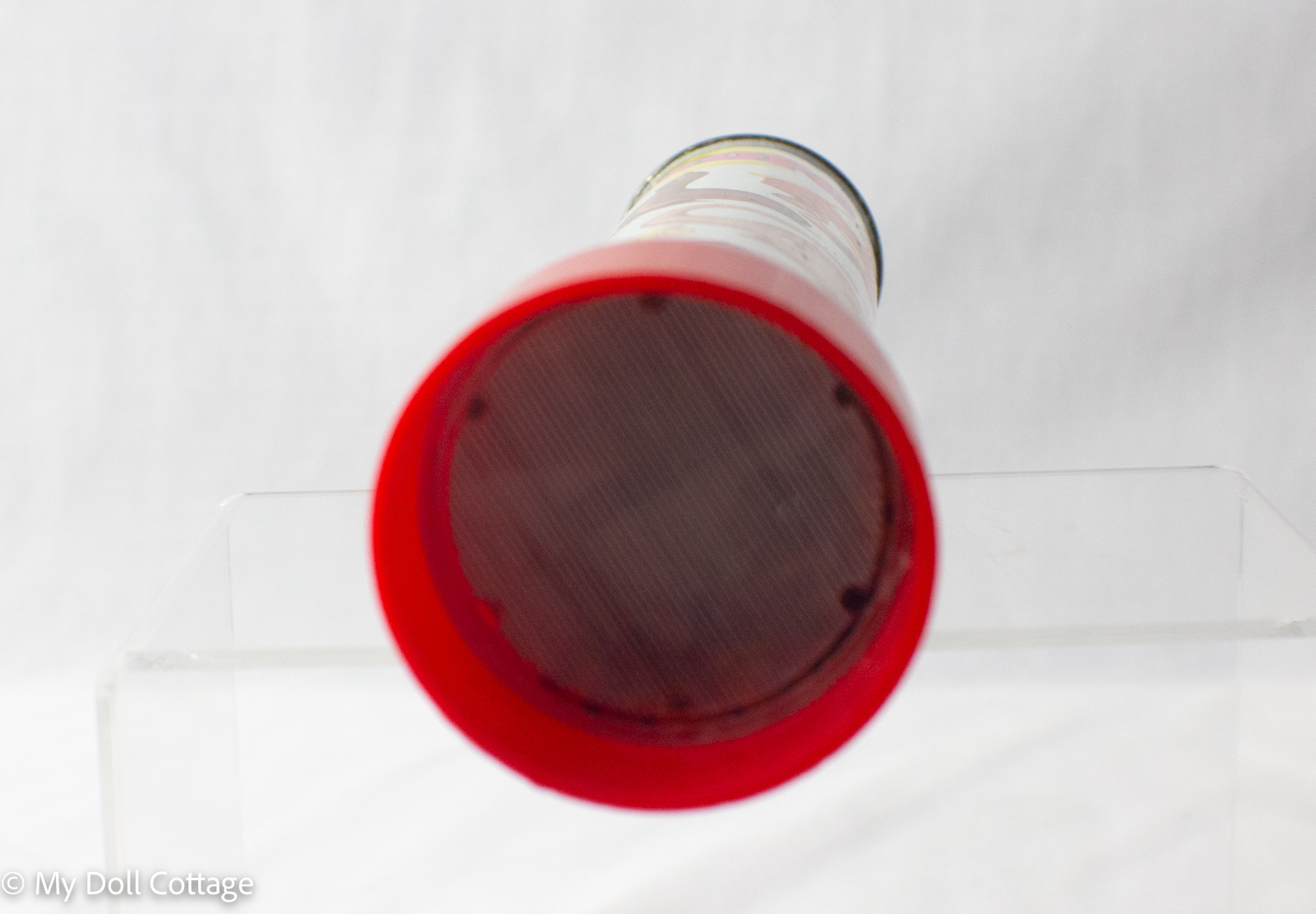 Base view showing translucent red plastic light cap