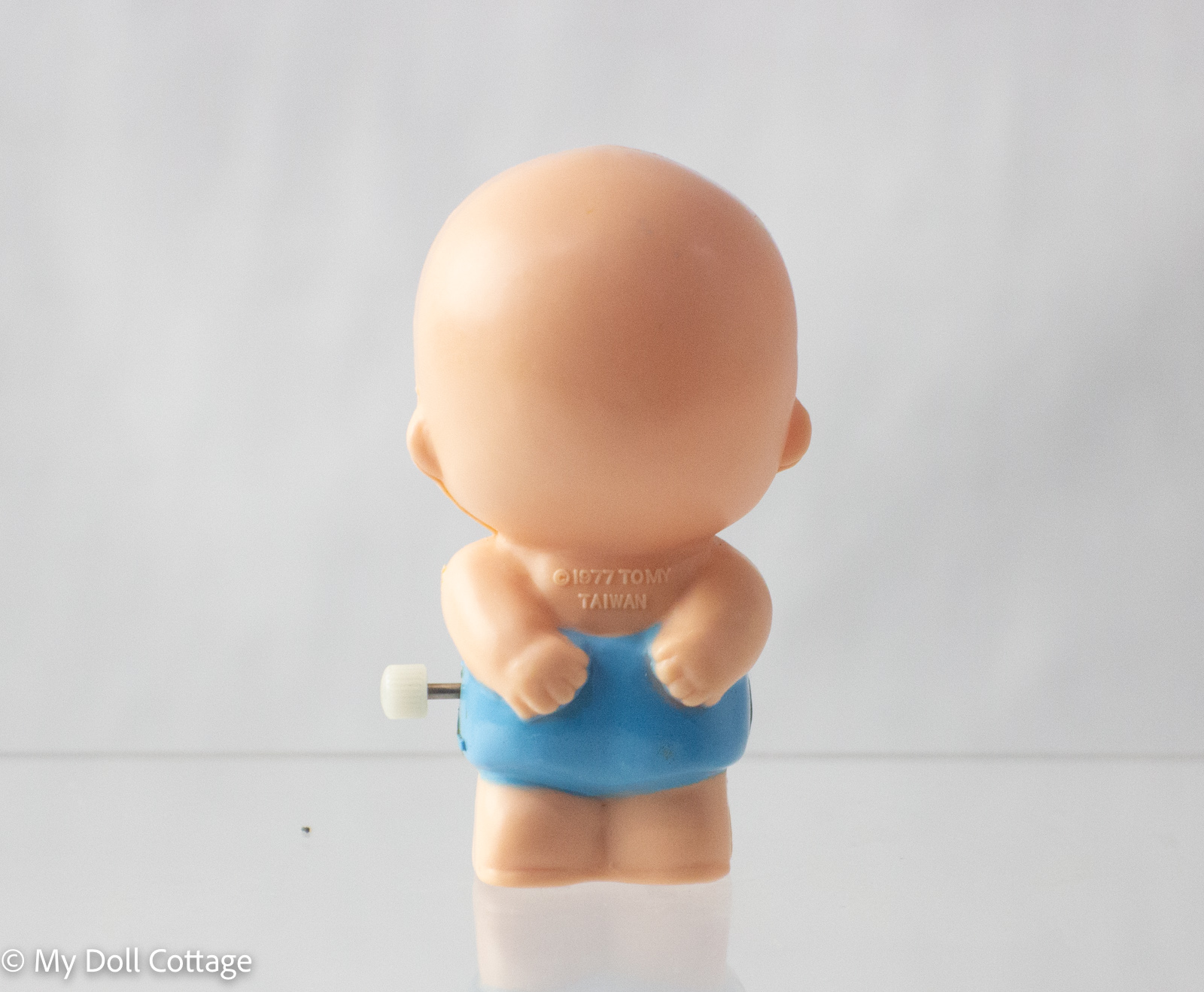 – Rear view showing embossed “© 1977 Tomy Taiwan” marking.