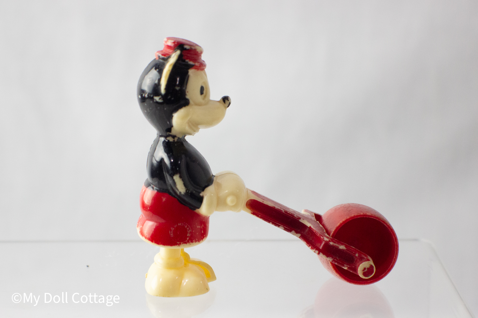 Alternate side profile highlighting paint wear on black and red areas