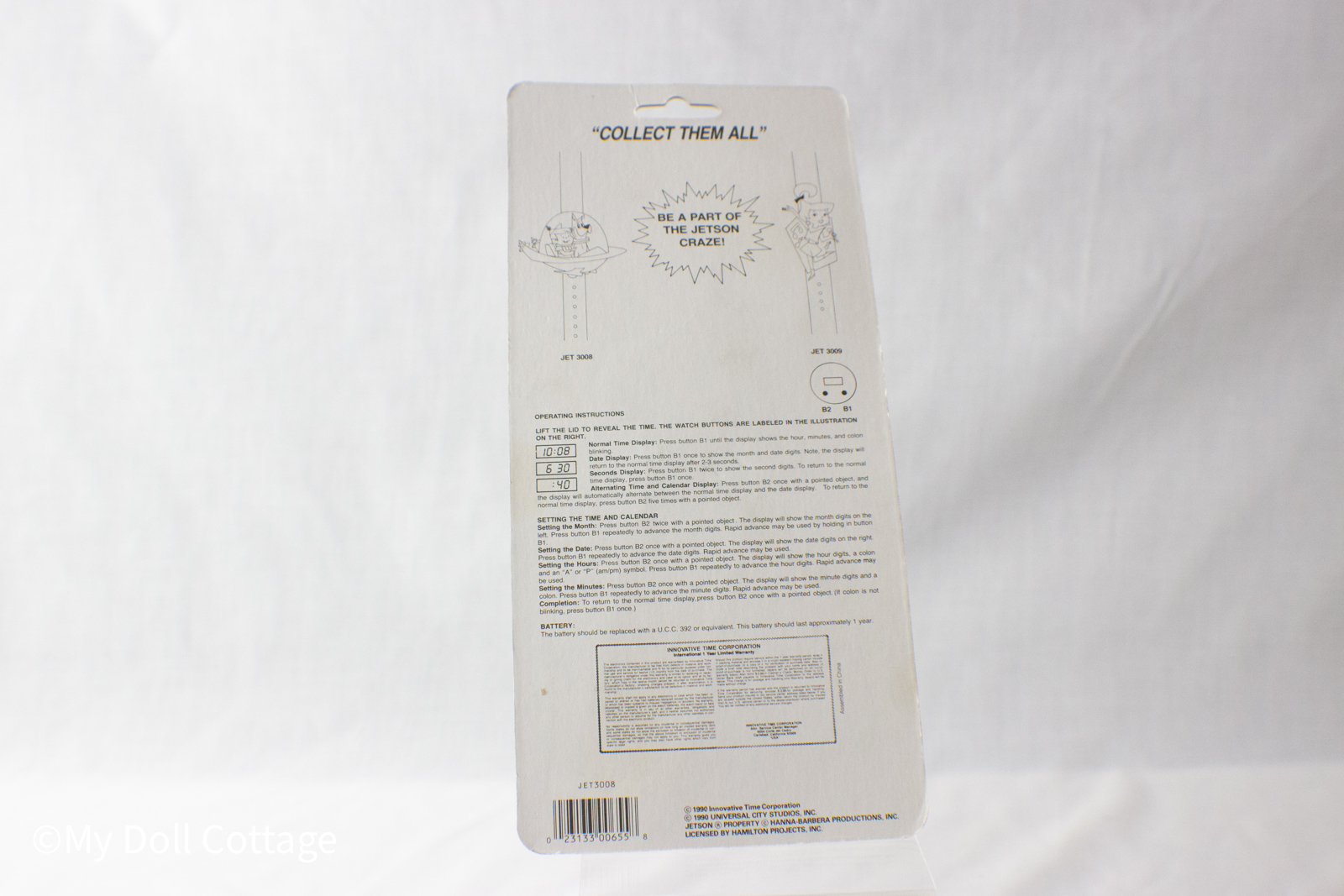 Rear view of packaging displaying printed operating instructions, model number JET3008, and license information.