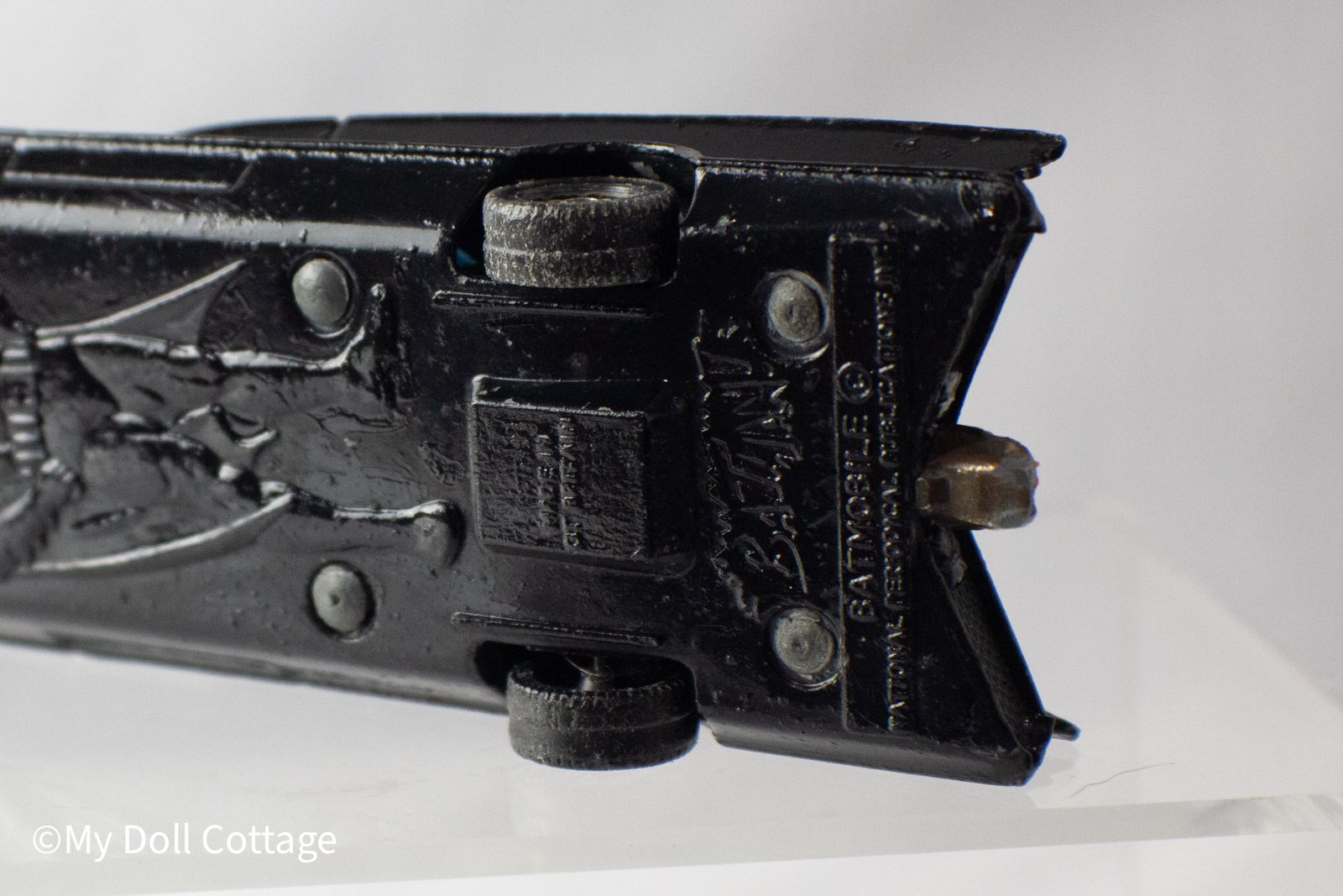 Underside close-up showing embossed markings “Made in Great Britain – Batmobile ©.”
