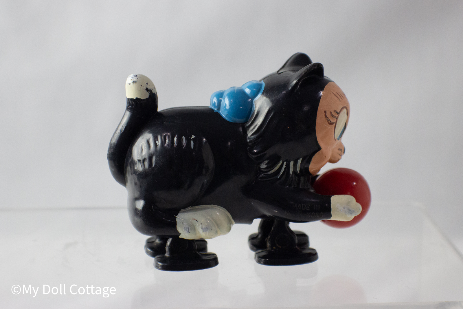 - Opposite side view of ramp walker cat showing tail and painted details.