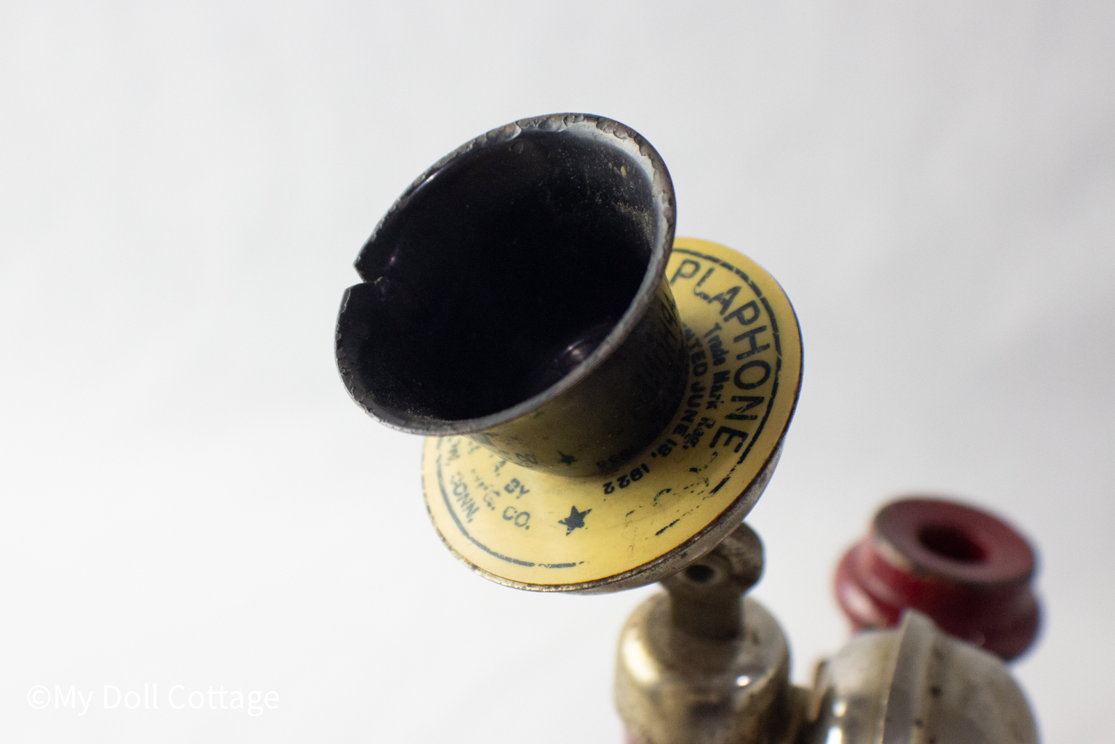 Close-up of patent marking reading “Playphone Trade Mark Reg. Patented June 18 1922 – Made in U.S.A.”