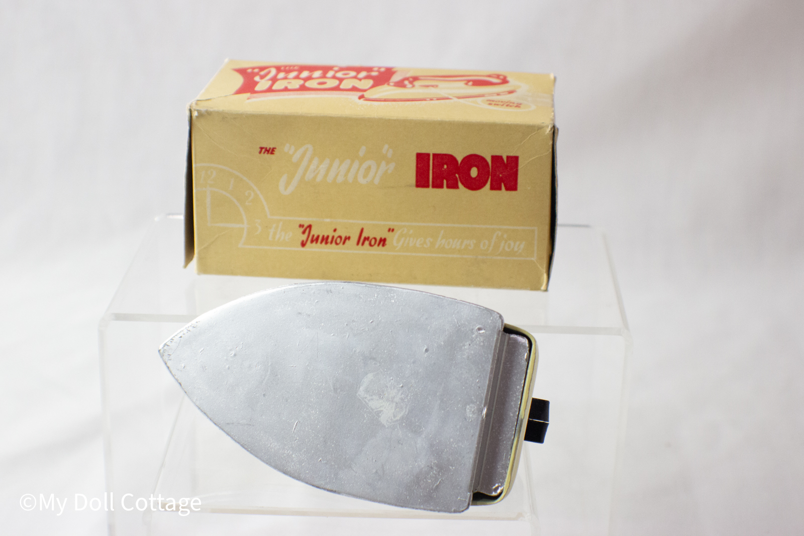 Underside view of the BCM Junior Iron showing the silver metal baseplate.