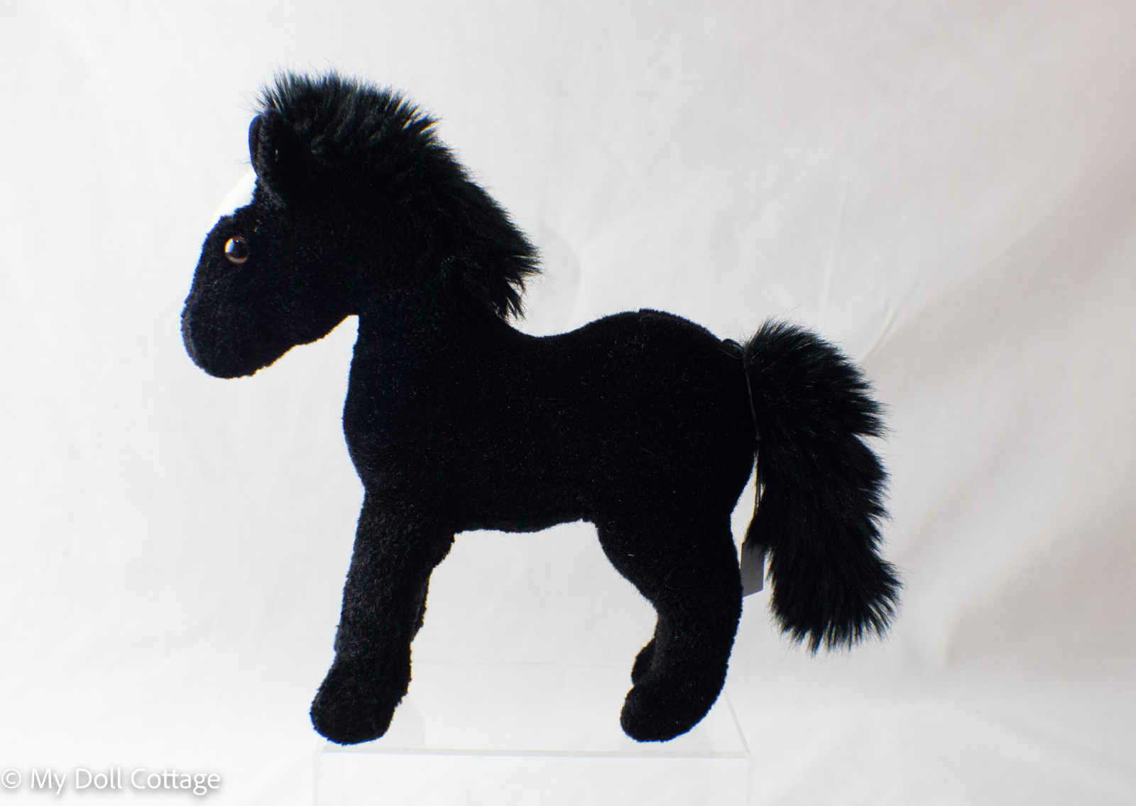 Front view of pony displaying facial detailing and plush texture.