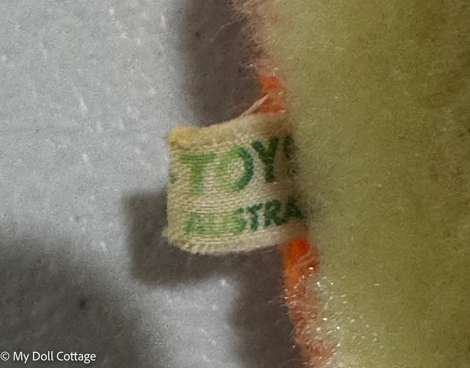 Close-up of Joy Toys fabric tag showing “Made in Australia”