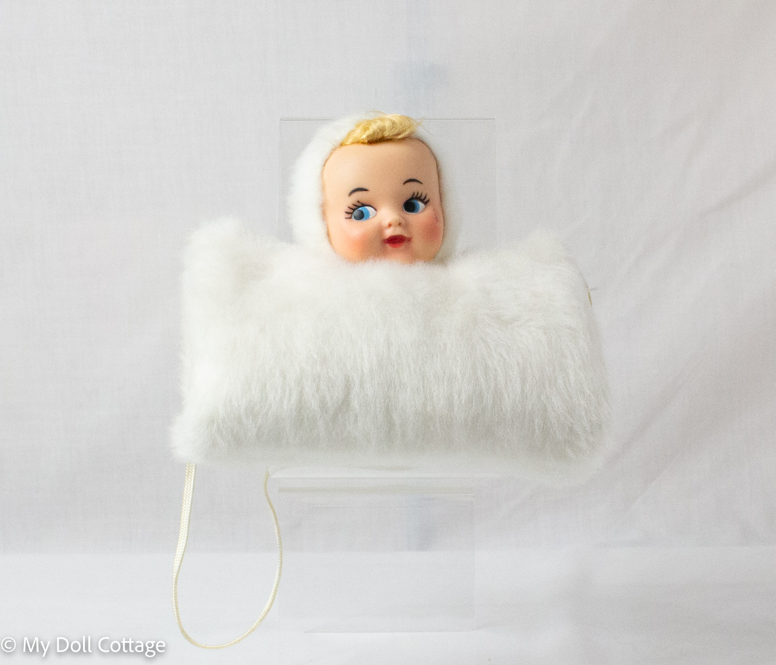 c.1955–1965 Child’s Faux Fur Muff with Rubber Doll Face