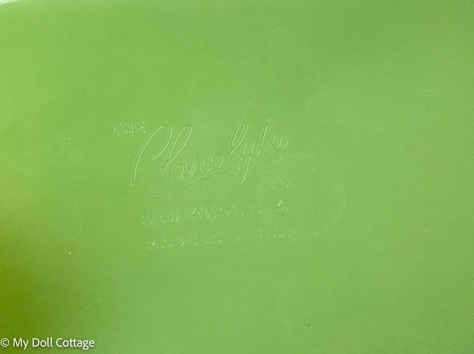 Close-up of embossed manufacturer details.