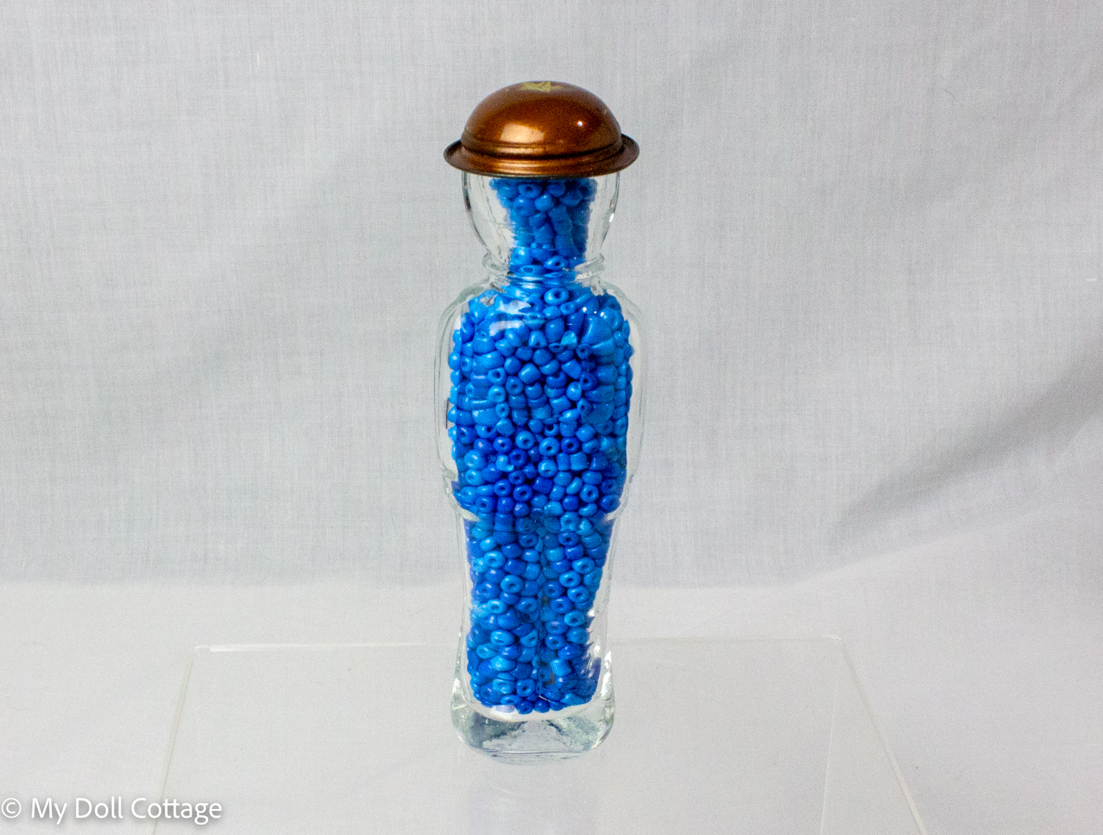 Rear view of the glass soldier candy container.