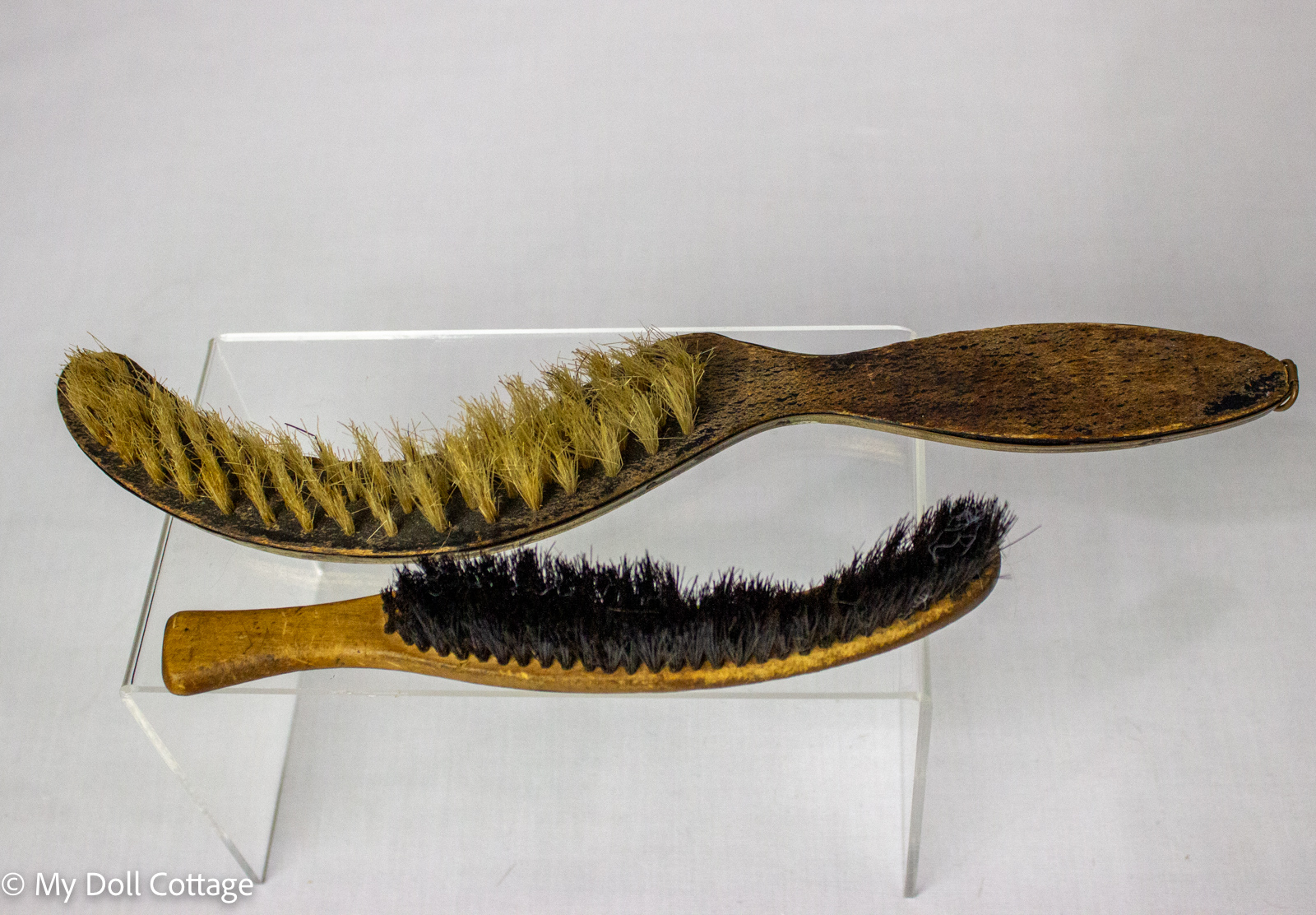 c. 1890–1910 Set of Two Clothes Brushes – Wood and Decorative Pressed Metal