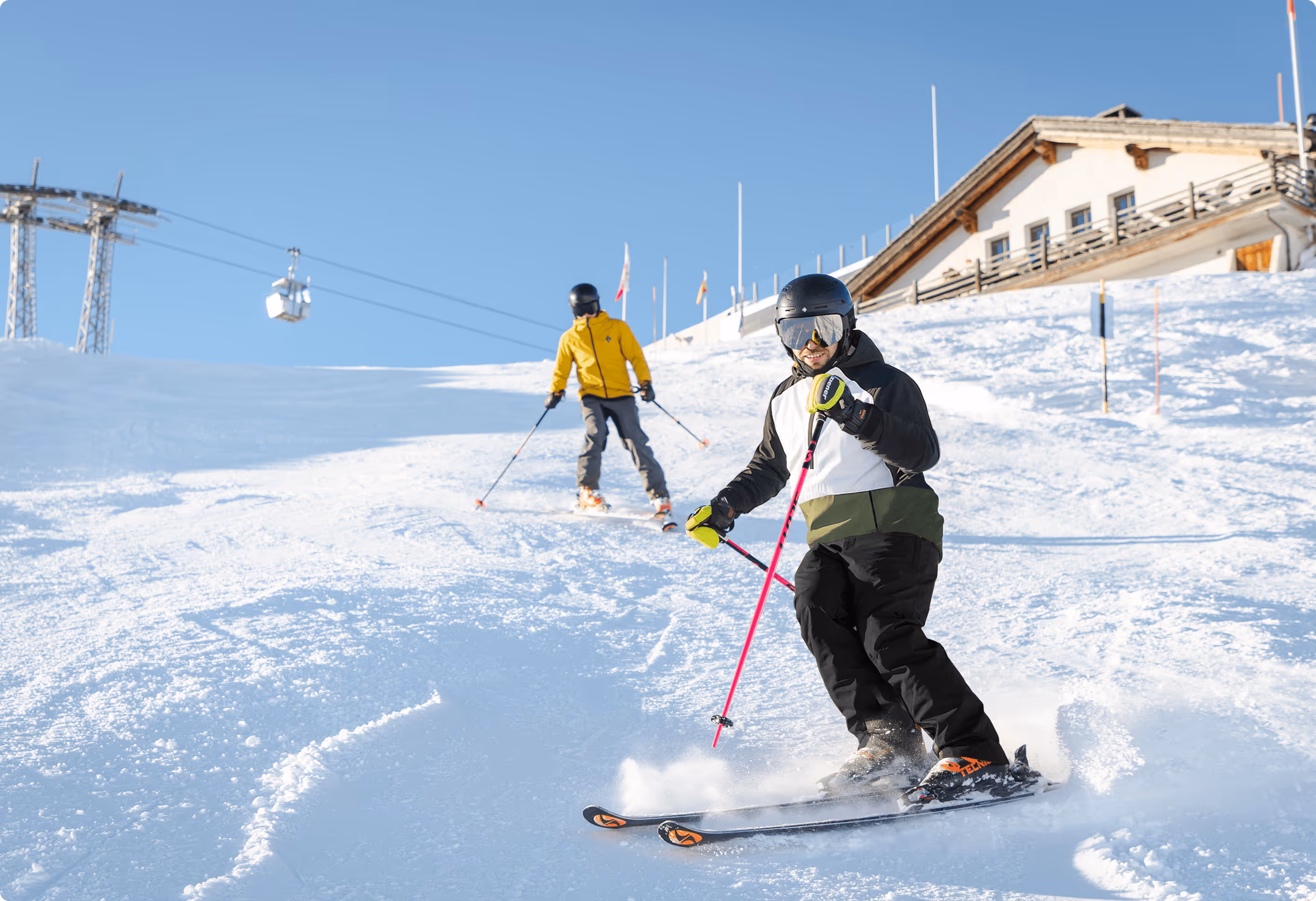 A Pulse Snowsports ski instructor leading a student down the slopes of Savoleyre