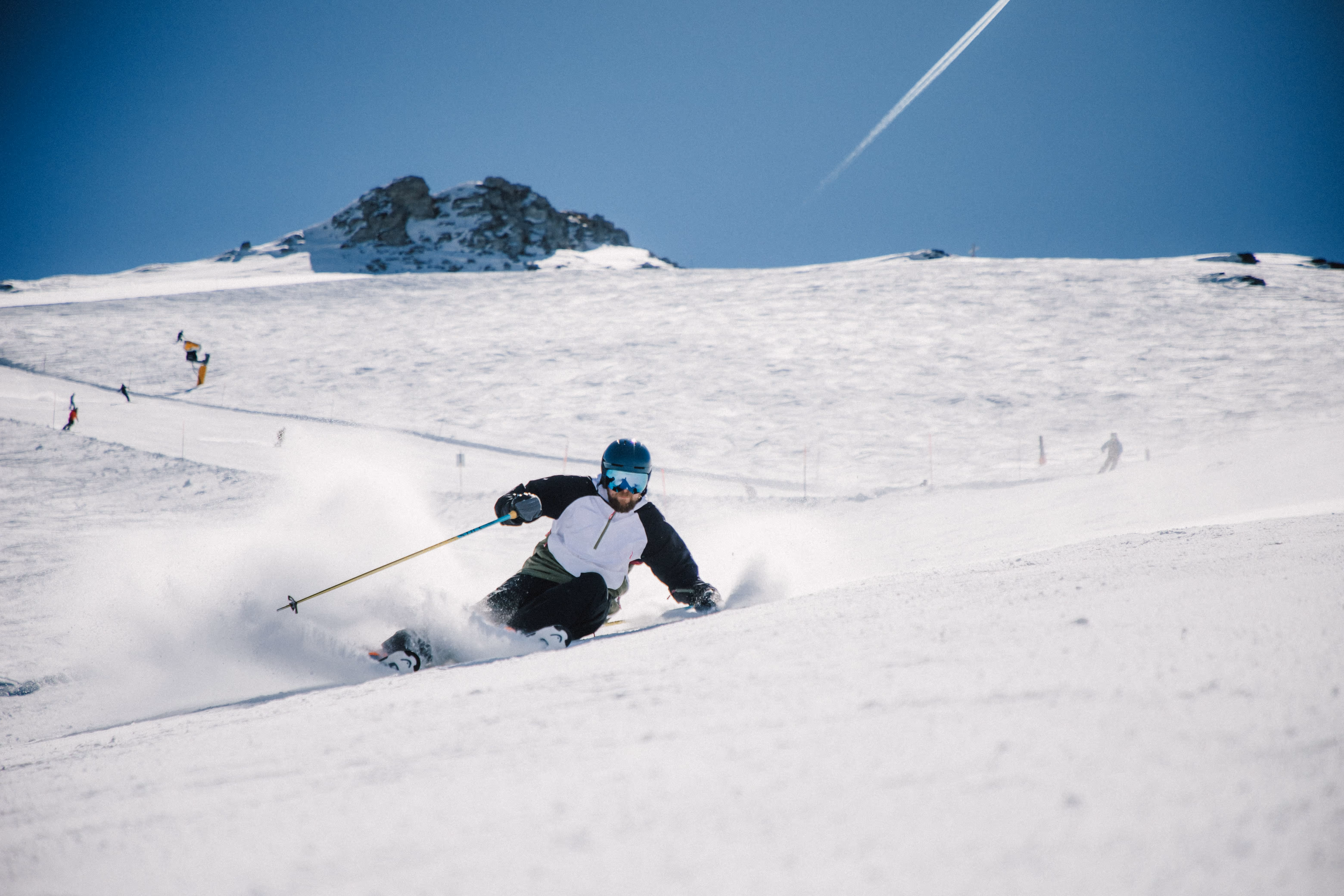 Big angles on the slopes during a carving turn from a Pulse ski instructor 