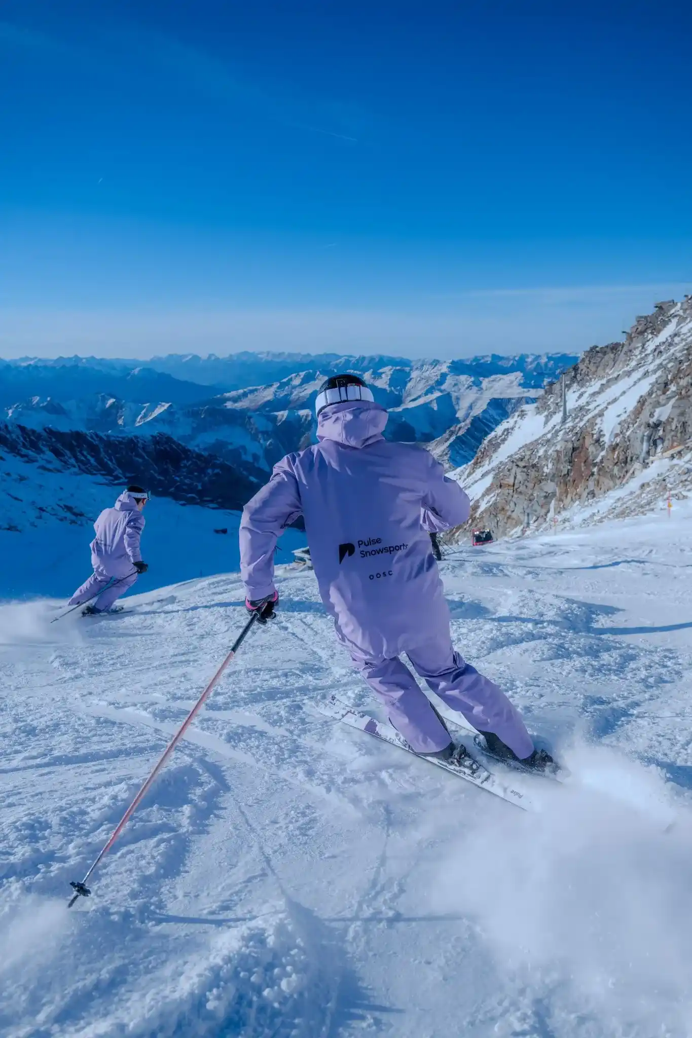Pulse Skiers skiing together
