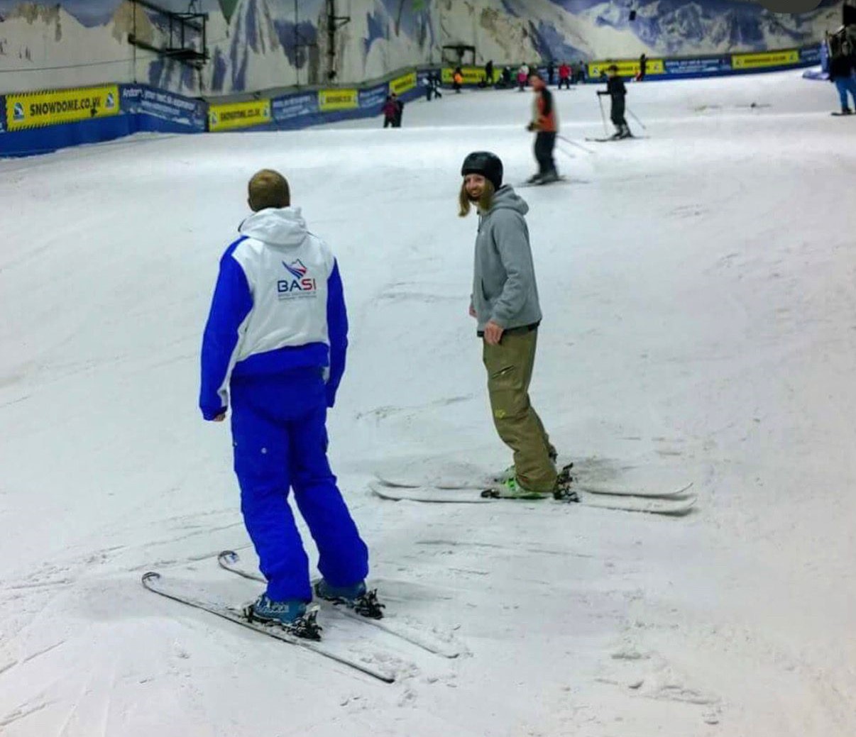 Anthony Whitfield taking part in a BASI Level 1 ski instructor assessment at an indoor snow centre in the UK.
