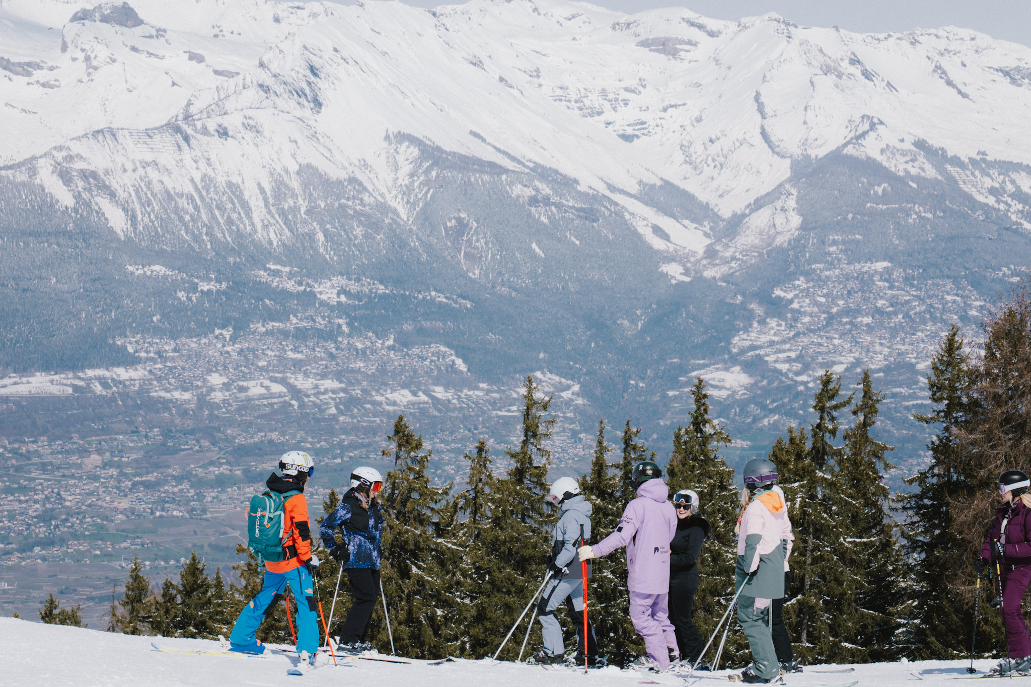 Adult skiers learning together during a Pulse Snowsports group coaching clinic.