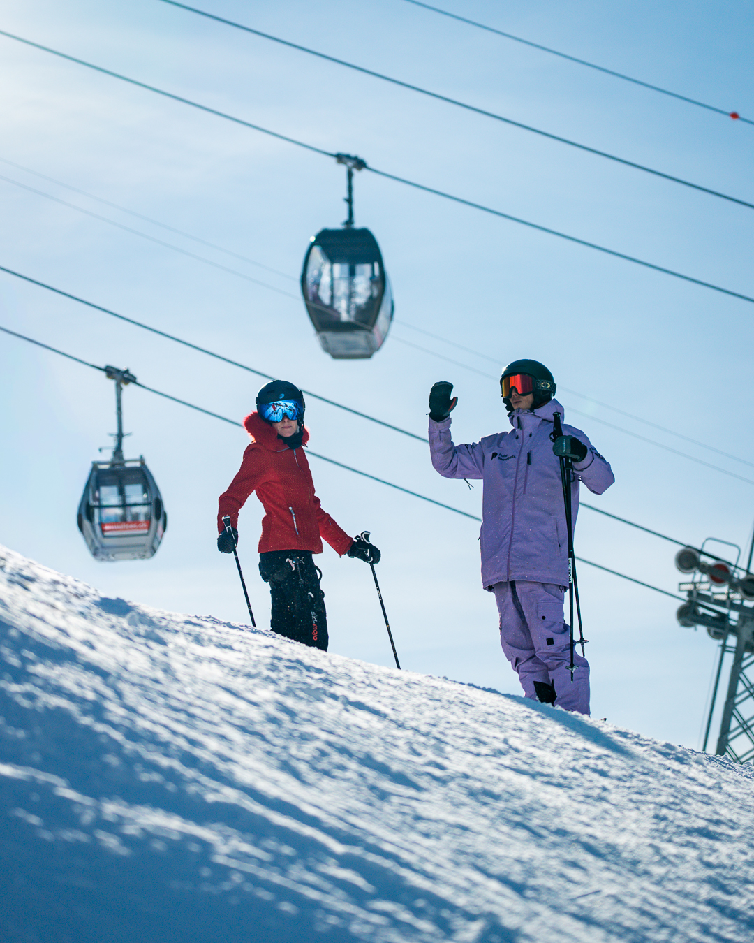Pulse Snowsports instructor discussing goals with a client before skiing in Verbier.