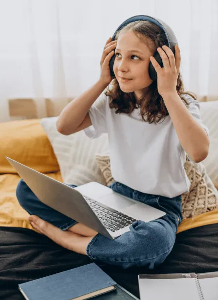 Child in headphones

