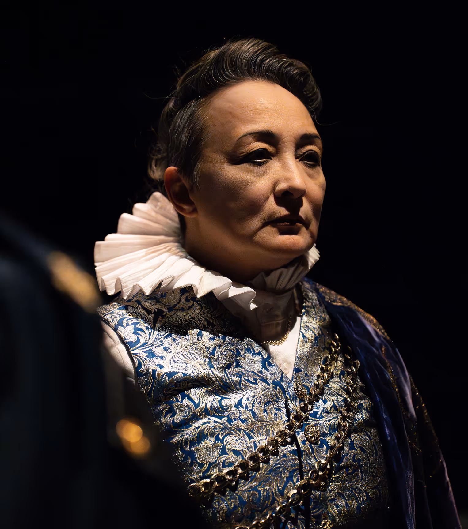 Actor in ornate costume at Actors Theatre of Louisville delivers intense, dramatic performance.
