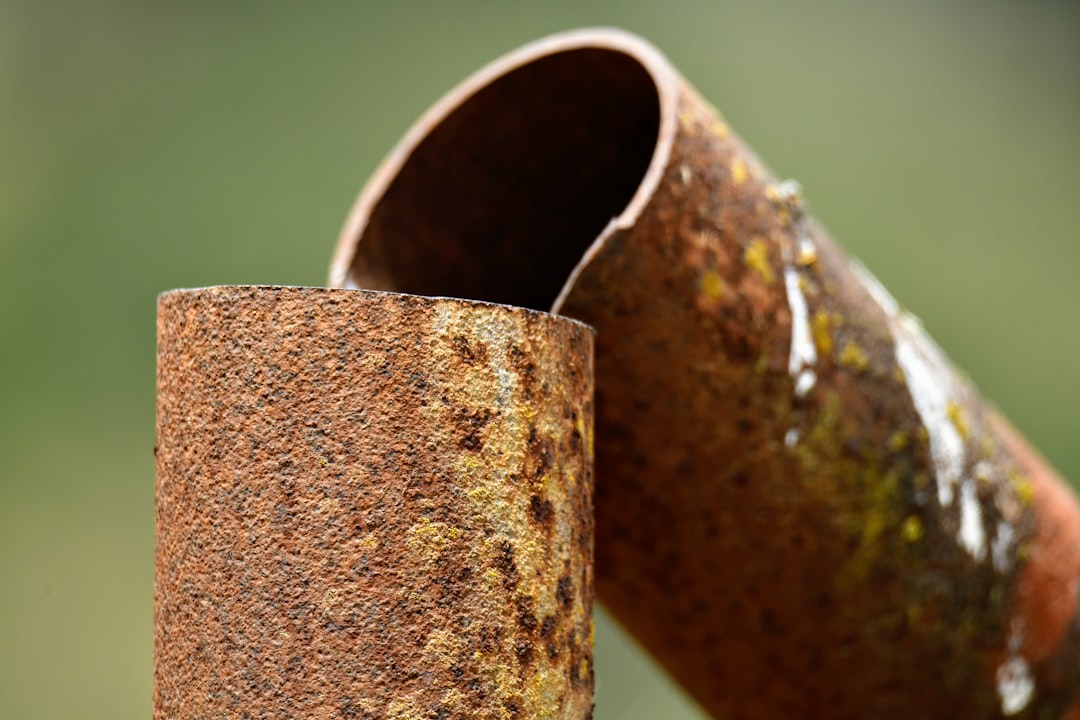 close up of corroded aluminum condenser coils with white salt deposits
