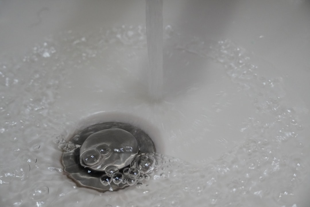 of water running into the sink to test for leaks - garbage disposal installation of water running into the sink to test for leaks - garbage disposal installation