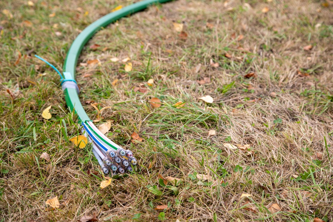 Geothermal ground loops being installed in a residential yard Geothermal ground loops being installed in a residential yard