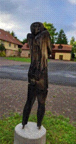 Afbeelding met buitenshuis, standbeeld, hemel, beeldhouwwerkDoor AI gegenereerde inhoud is mogelijk onjuist.