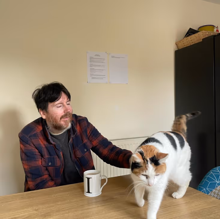 Man with a cat
