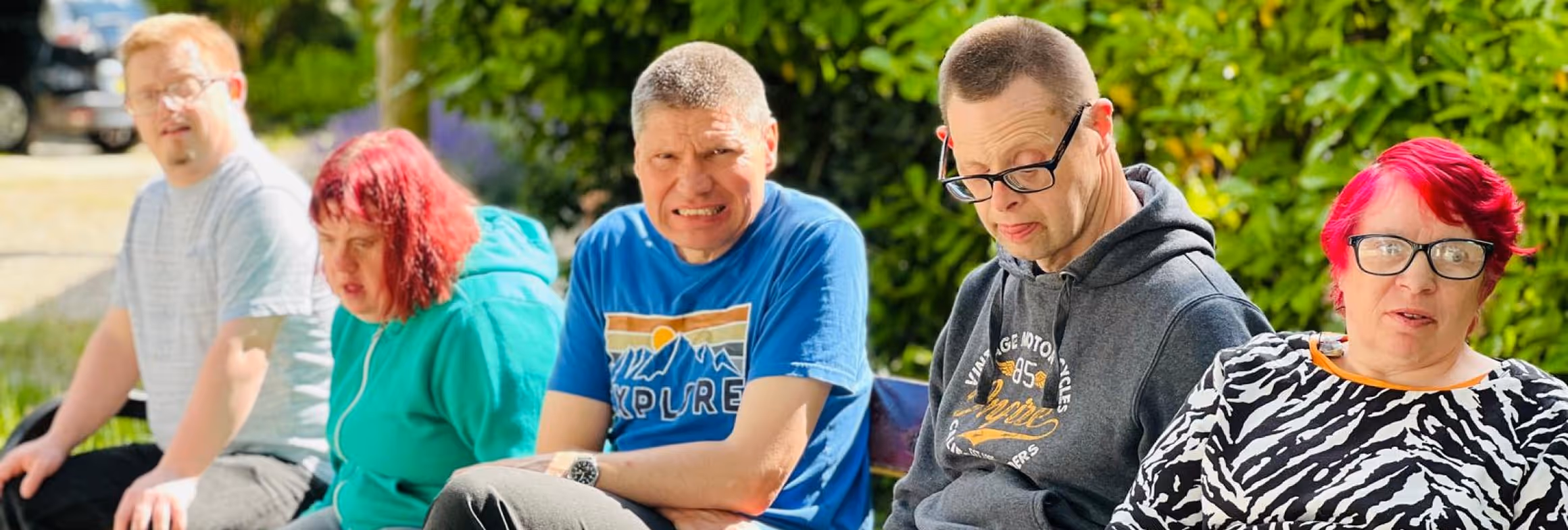 Service users on a bench