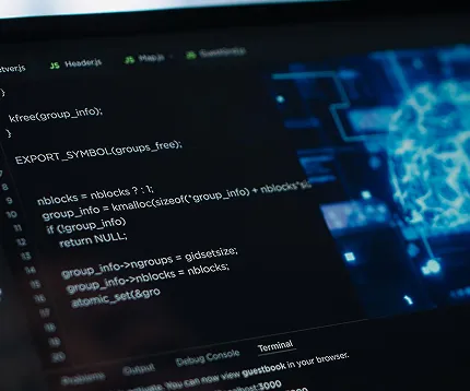 Computer screen displaying programming code with a digital network visualization on the right side.