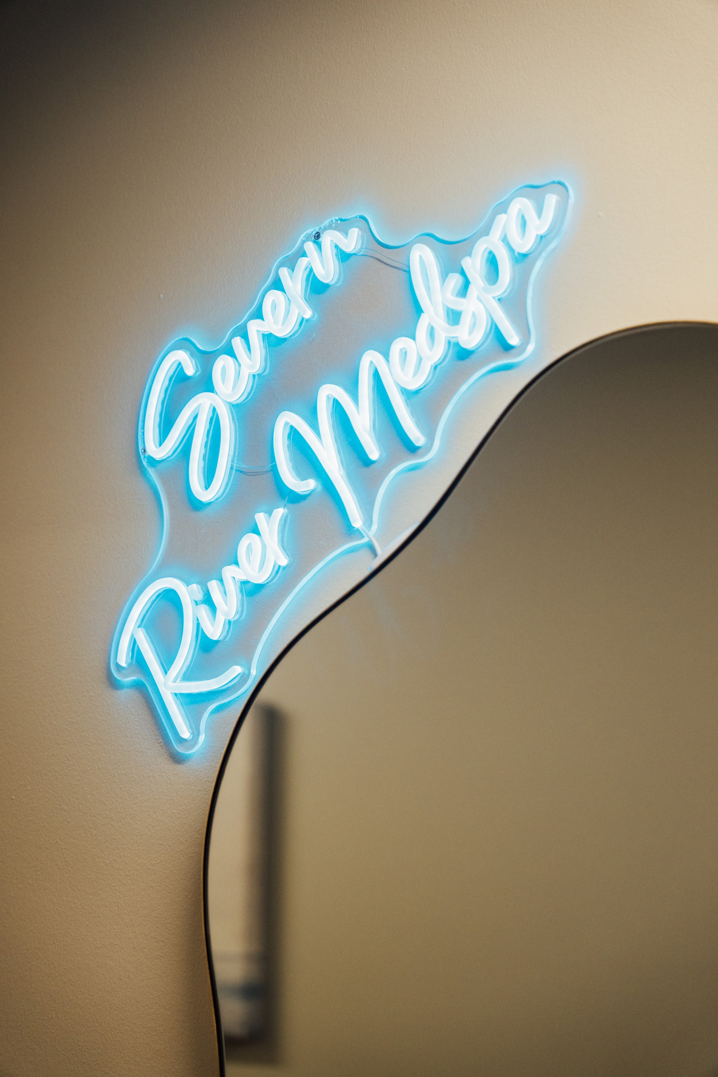 Severn River Medspa neon sign in the office