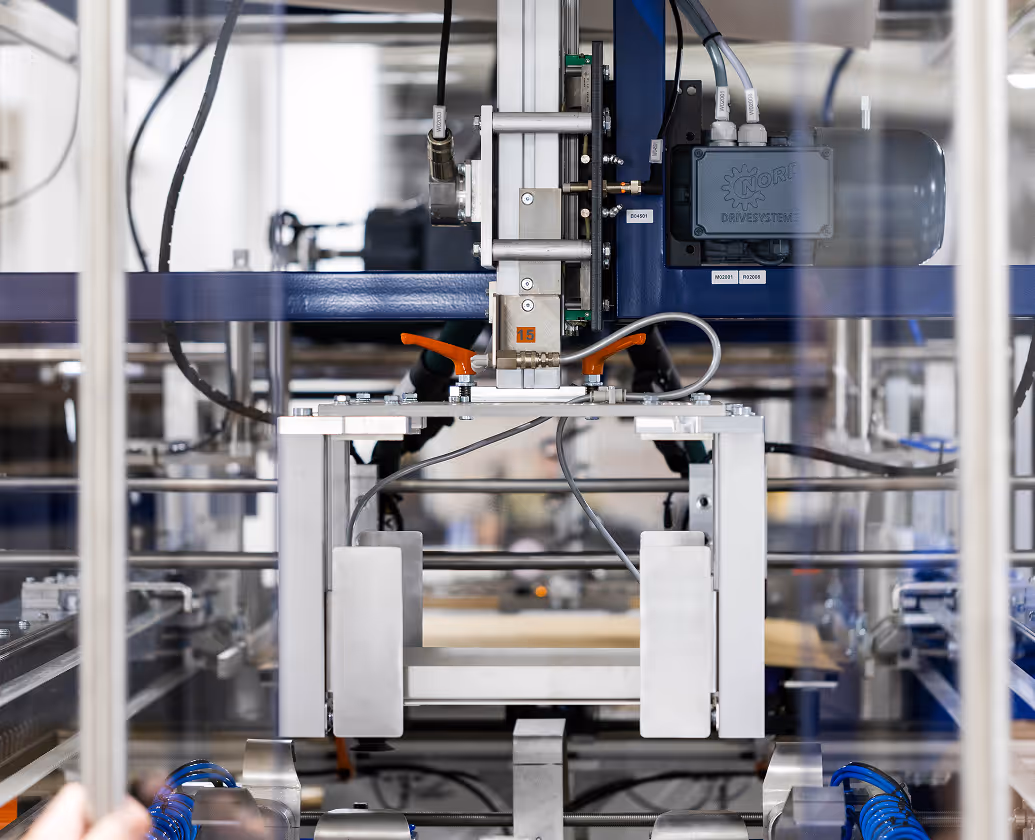 A machine with a blue and silver color scheme.