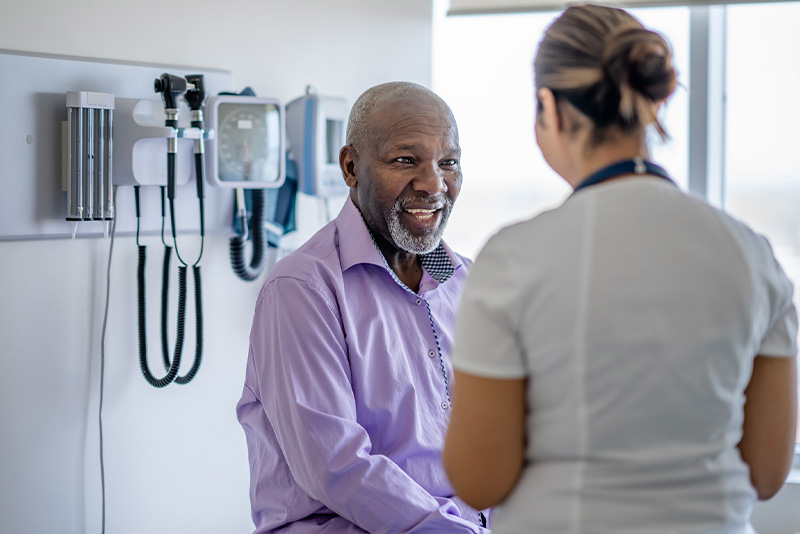 A patient speaking to a health professional