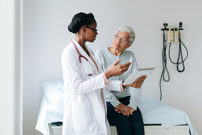 Doctor speaking with a patient