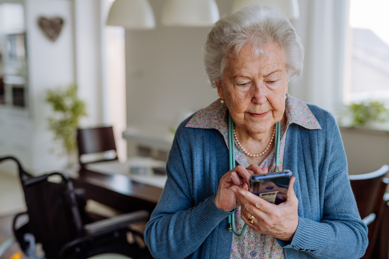 Medicare Advantage member on her cell phone
