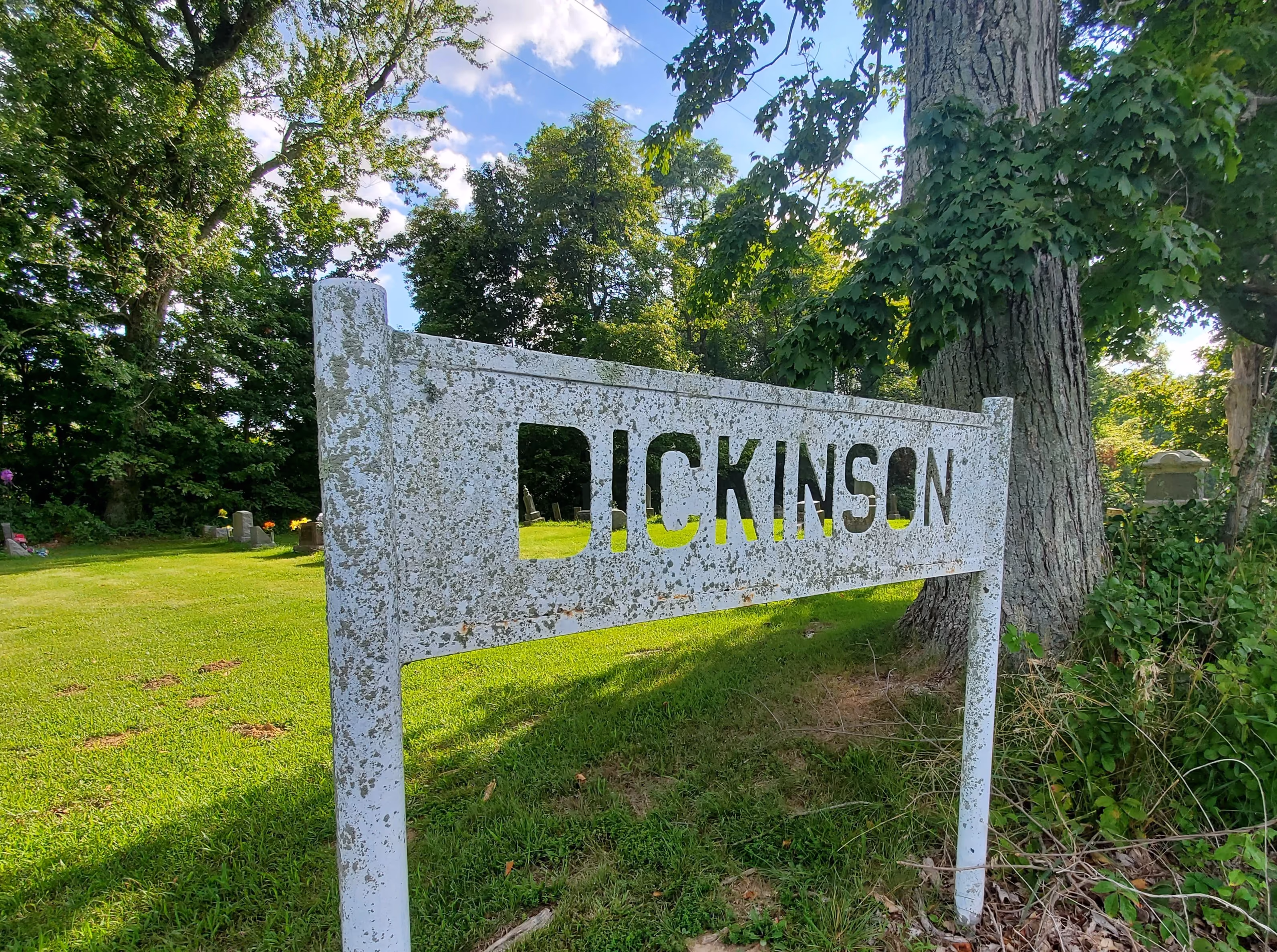 Photo of Dickinson Cemetery sign.