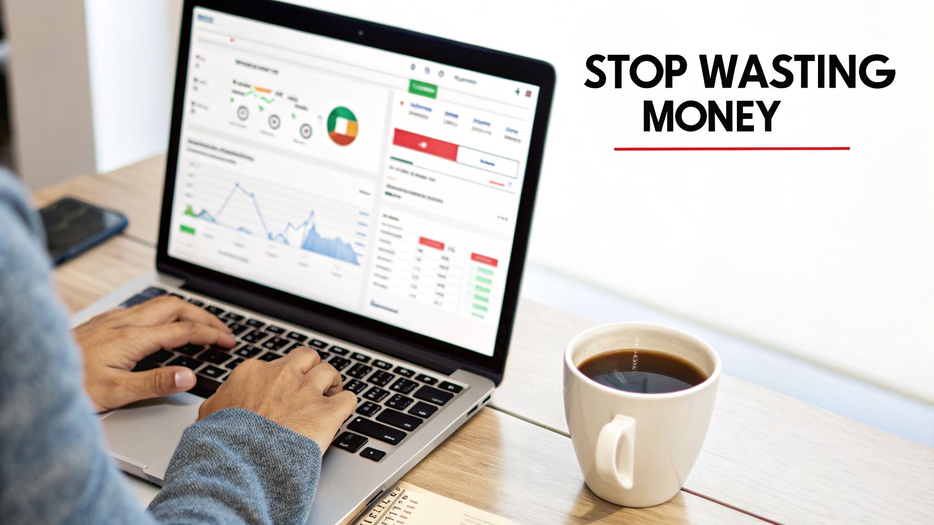 Person typing on a laptop displaying financial charts and graphs next to a cup of coffee.