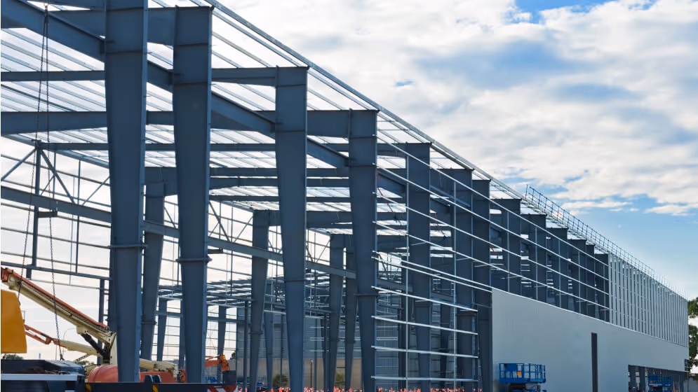 An industrial building being constructed.