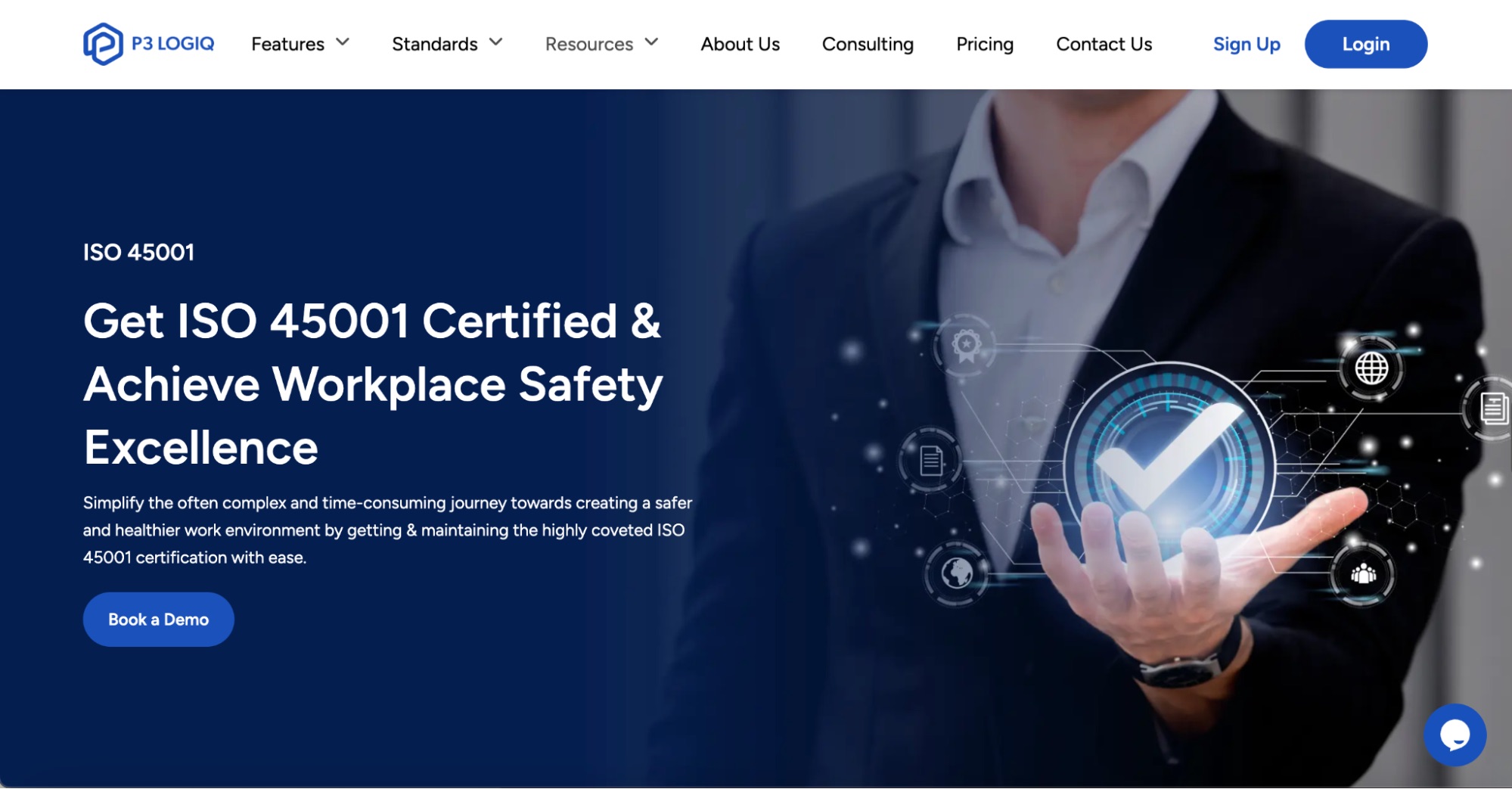 A business professional holding a digital safety compliance icon representing ISO 45001 workplace health and safety certification.
