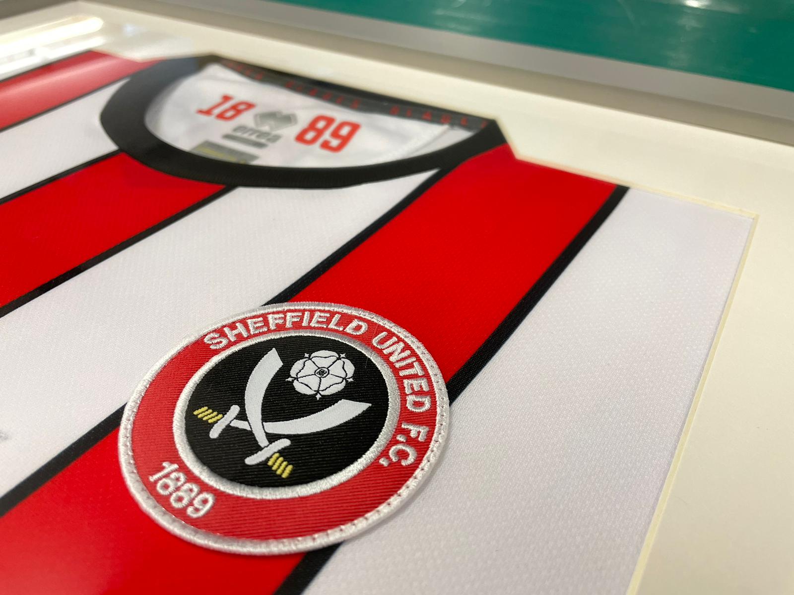 Framed football shirt