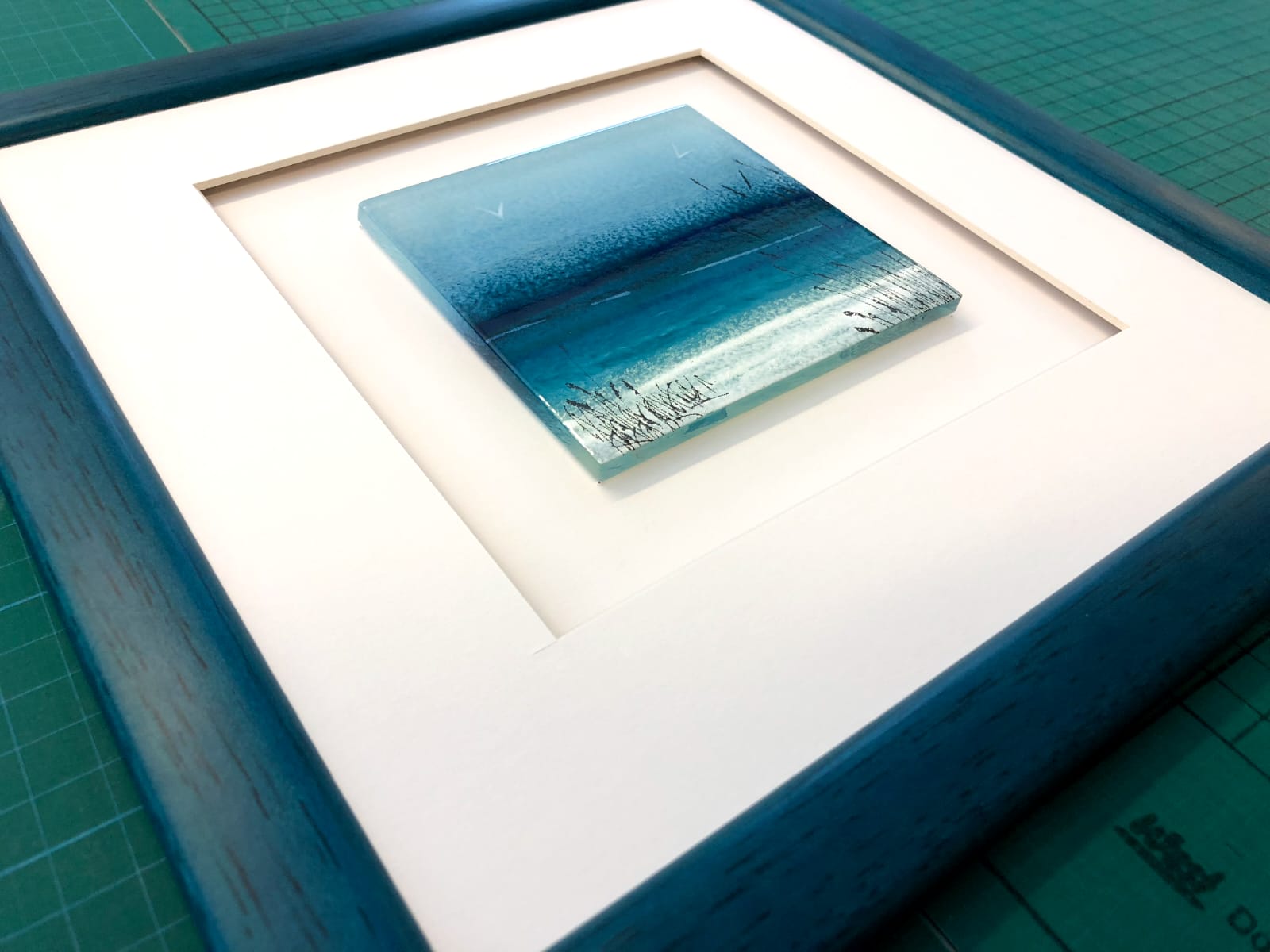 Framed with a framed piece of glass art