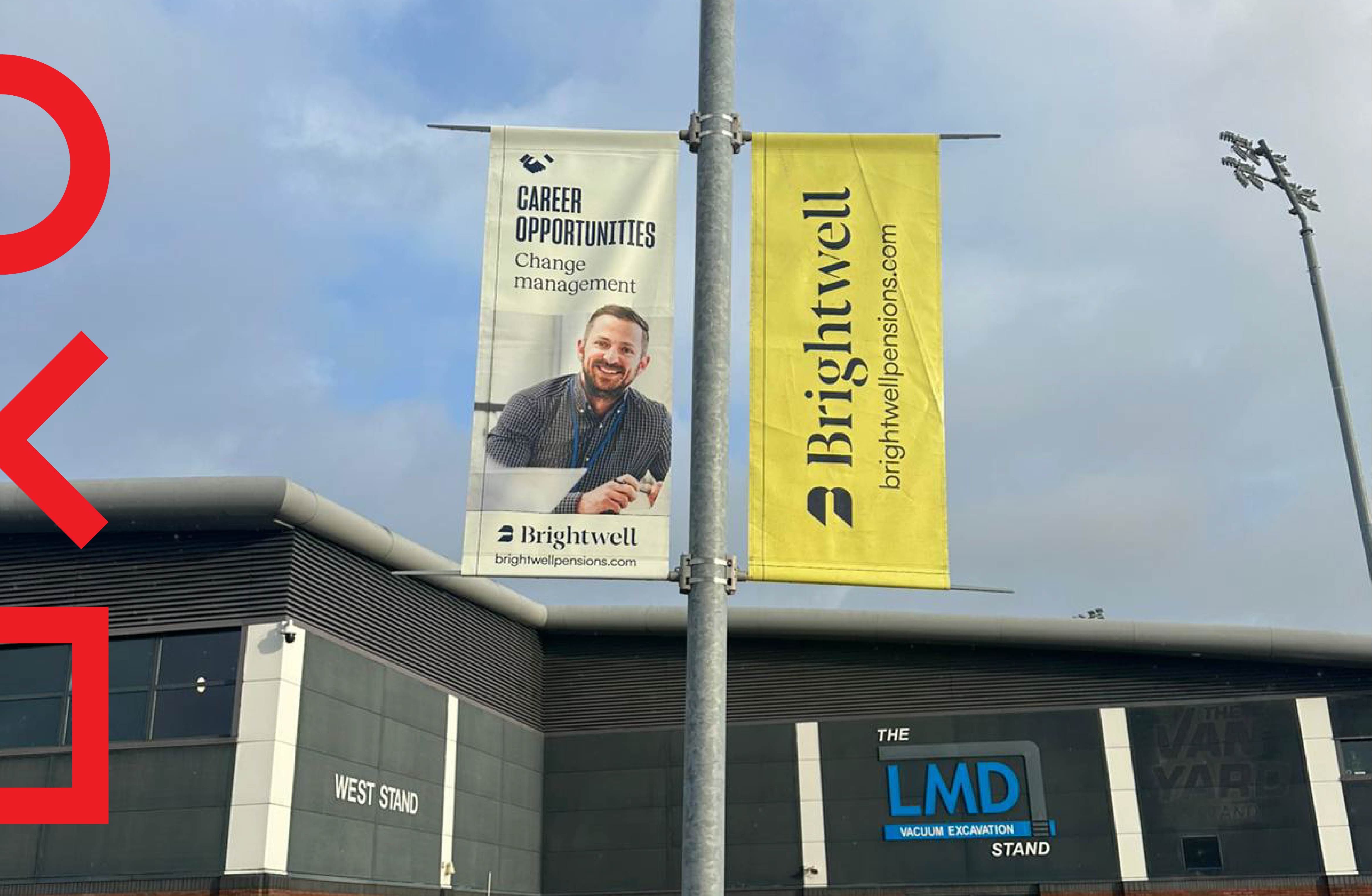 Outdoor football club branding on lamp post banners