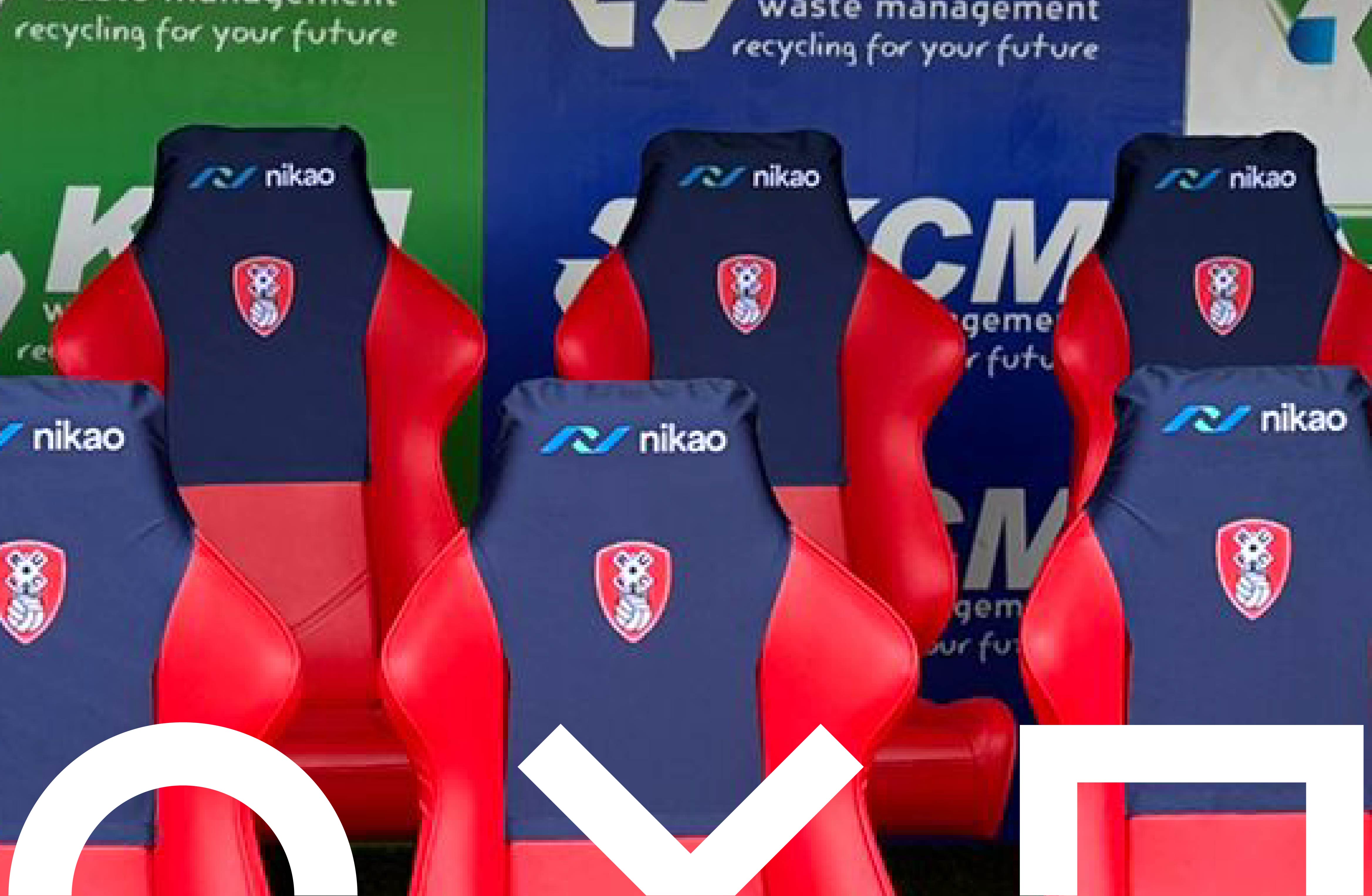 Stadium branding installation at Rotherham United including mesh banner and branded seat covers