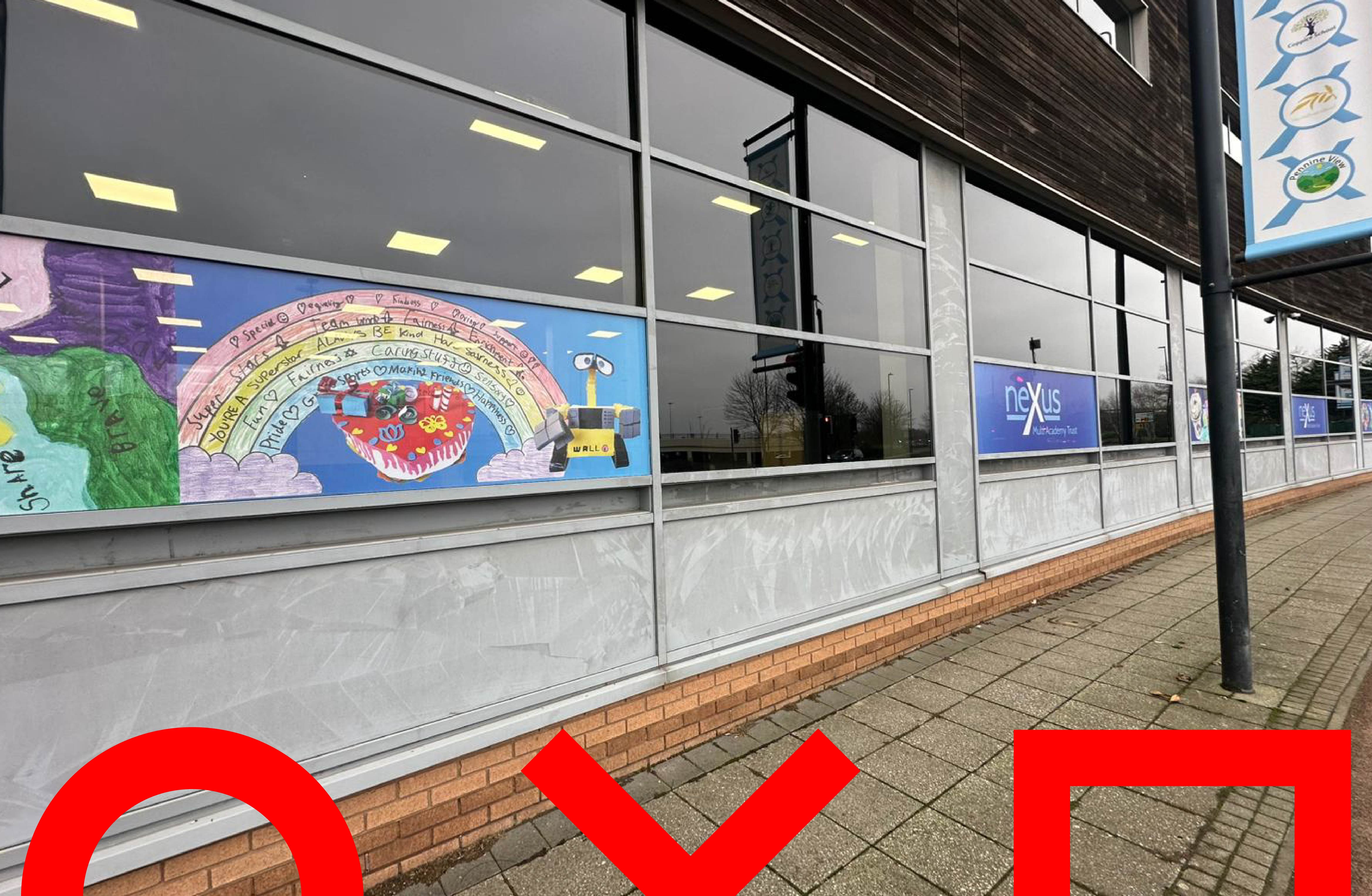 Colourful window graphics installation at Nexus Academy Trust school