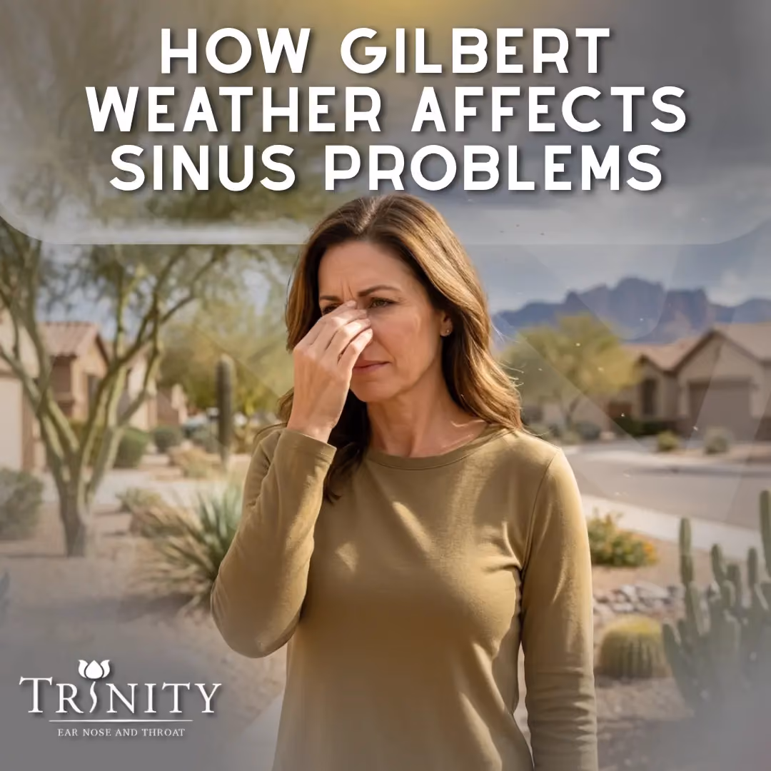 Woman in Gilbert, AZ pinching the bridge of her nose in sinus discomfort, with a desert neighborhood backdrop, for Trinity ENT's blog on weather and sinus problems